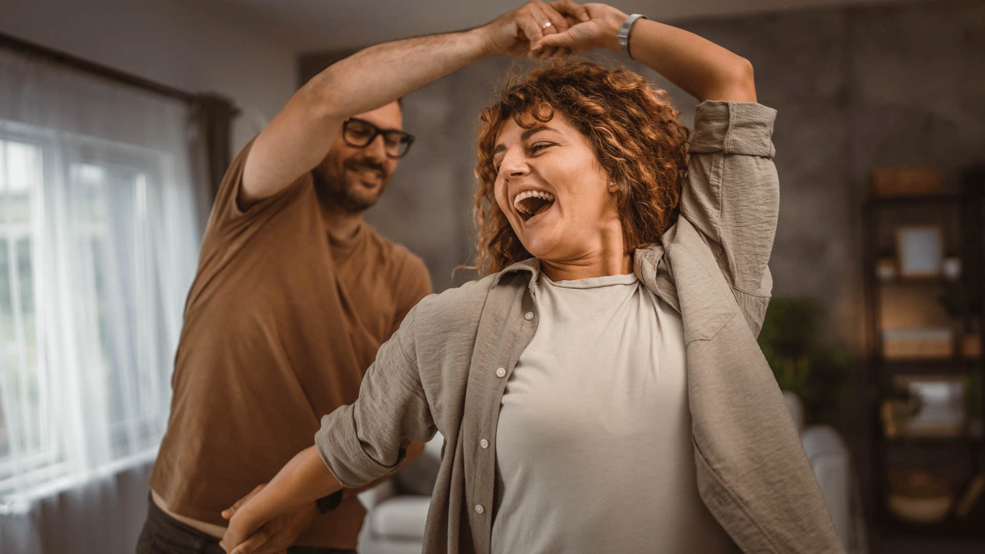 couple dancing and laughing