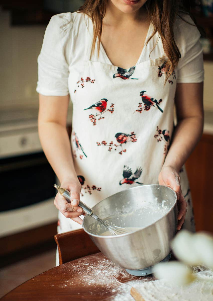 woman mixing ingredients in a bowl