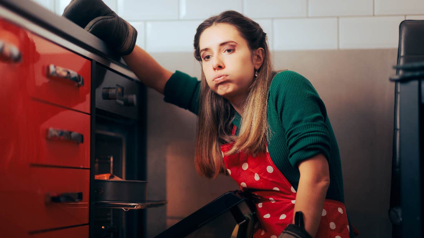 Woman cooking as a guest in someone's home