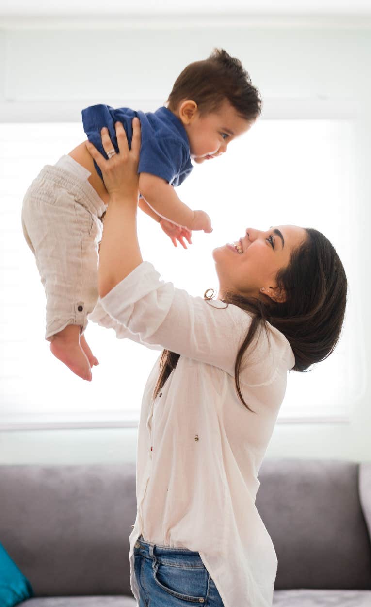 Woman holding toddler