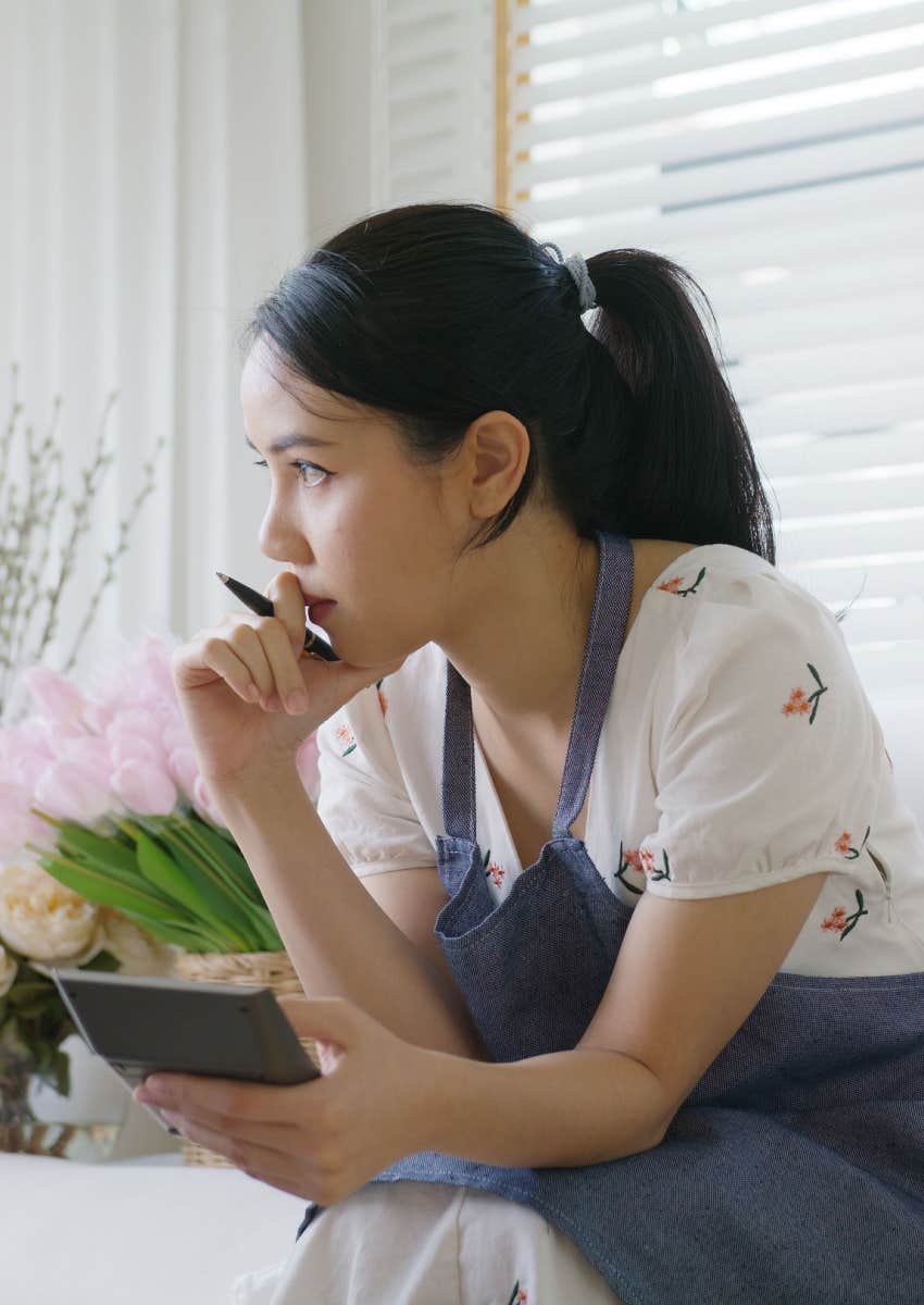 Woman looking at finances