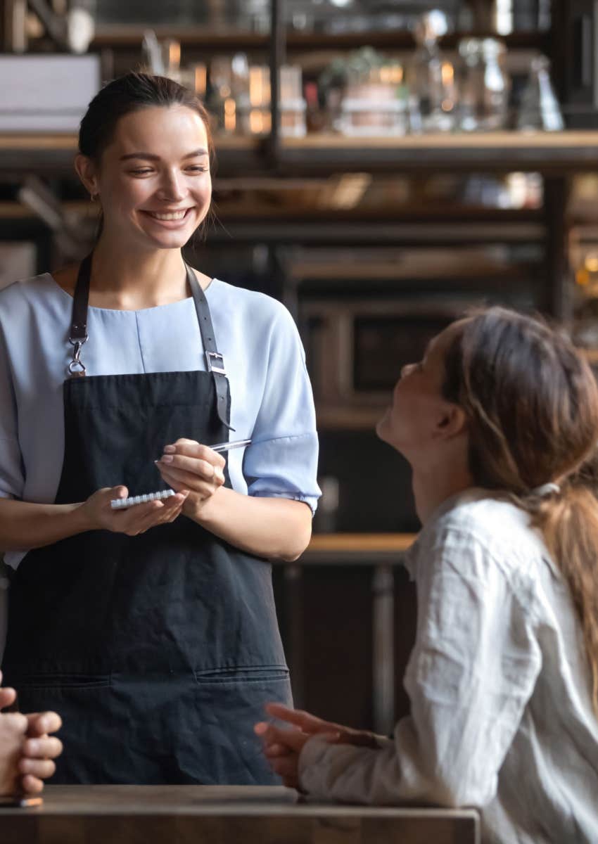 woman taking order