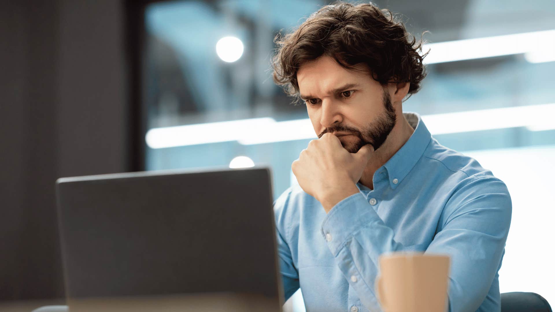 man concentrating on work