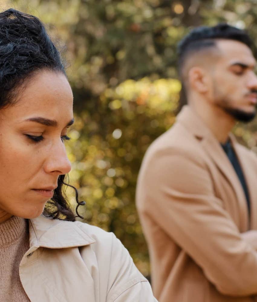 Tense woman and man in relationship where a good man stays when unhappy