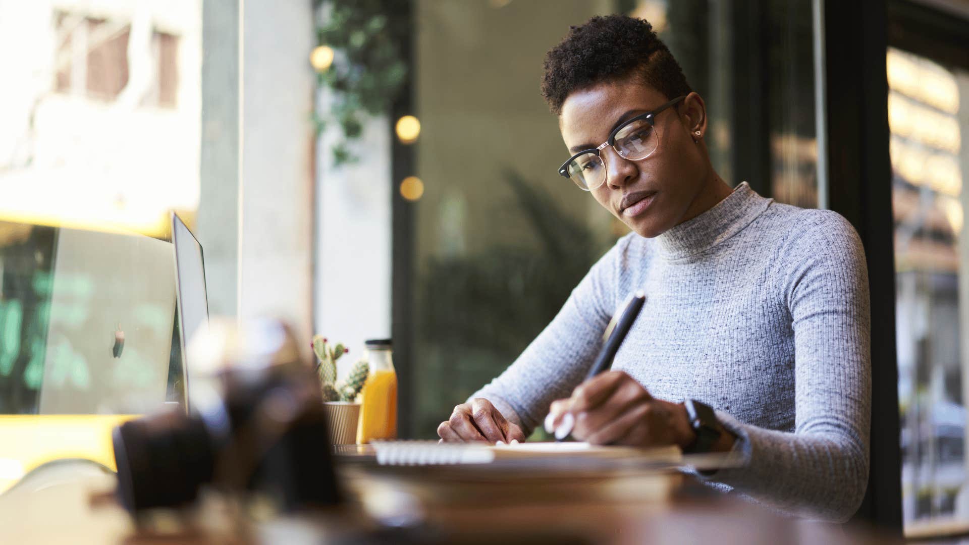 woman working diligently 