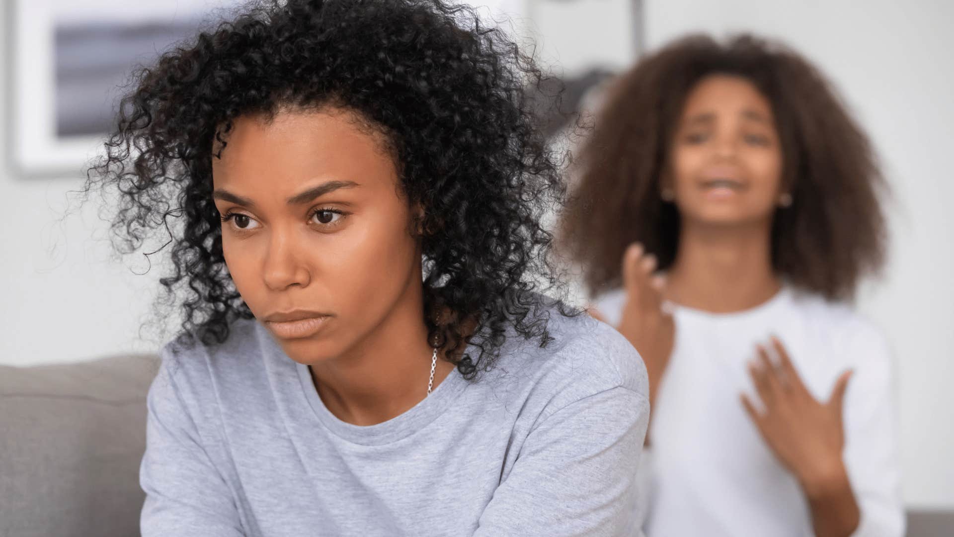 resentful mother with daughter crying