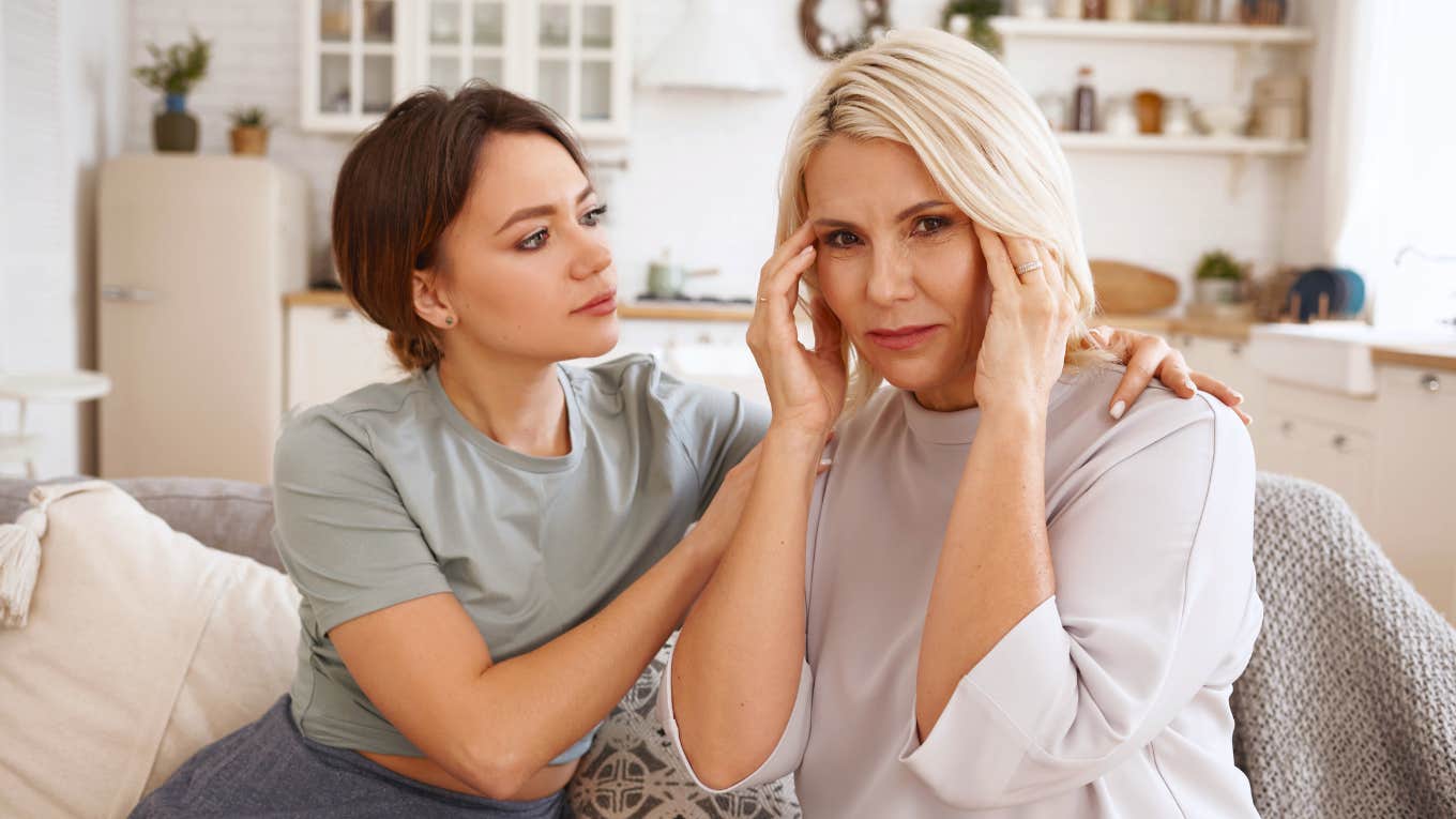 young woman taking her older mother for granted