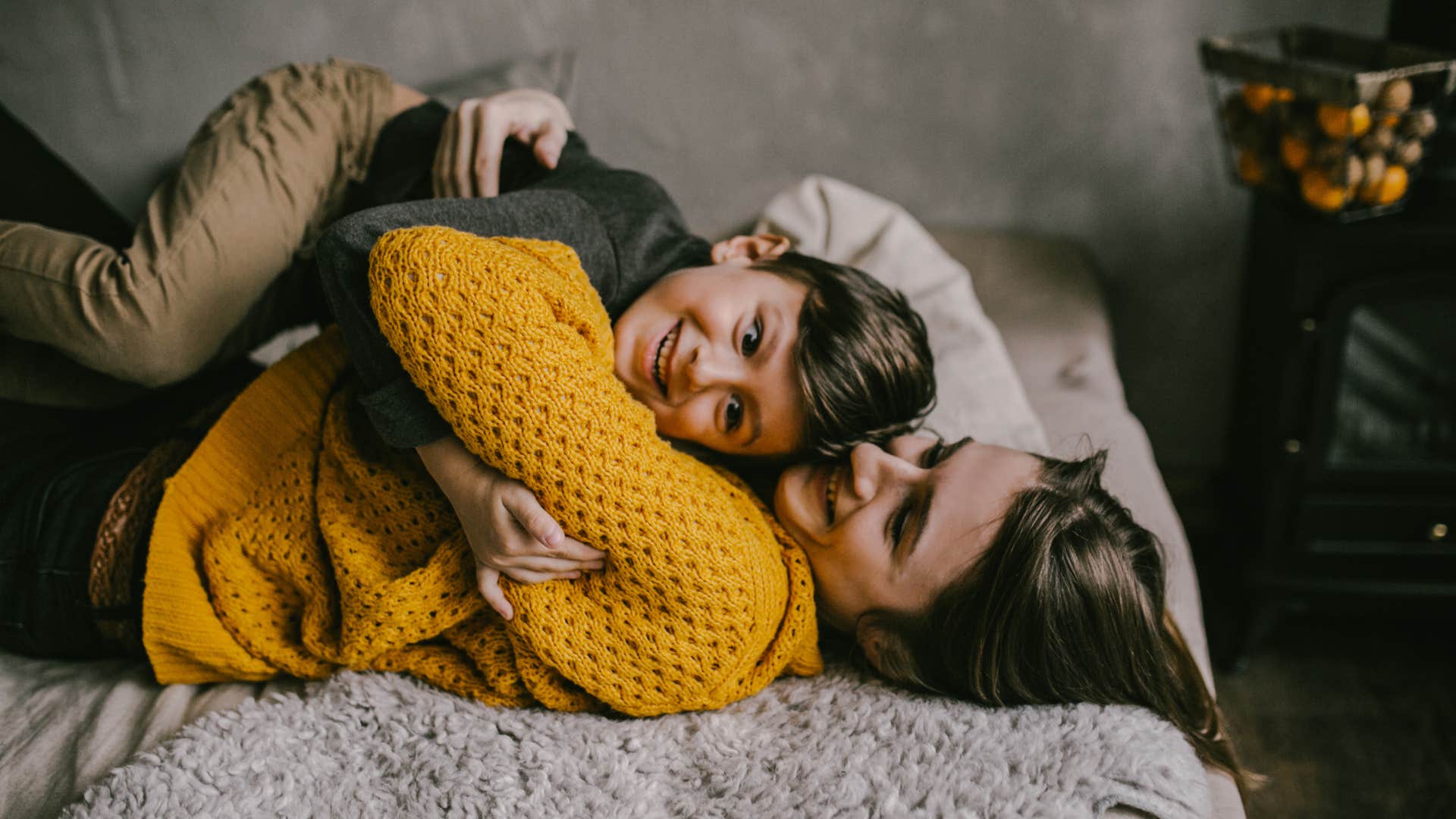 Mother and son having fun and playing together