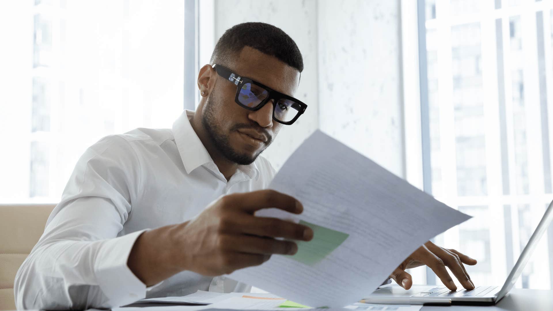 Man focused on accounting paperwork