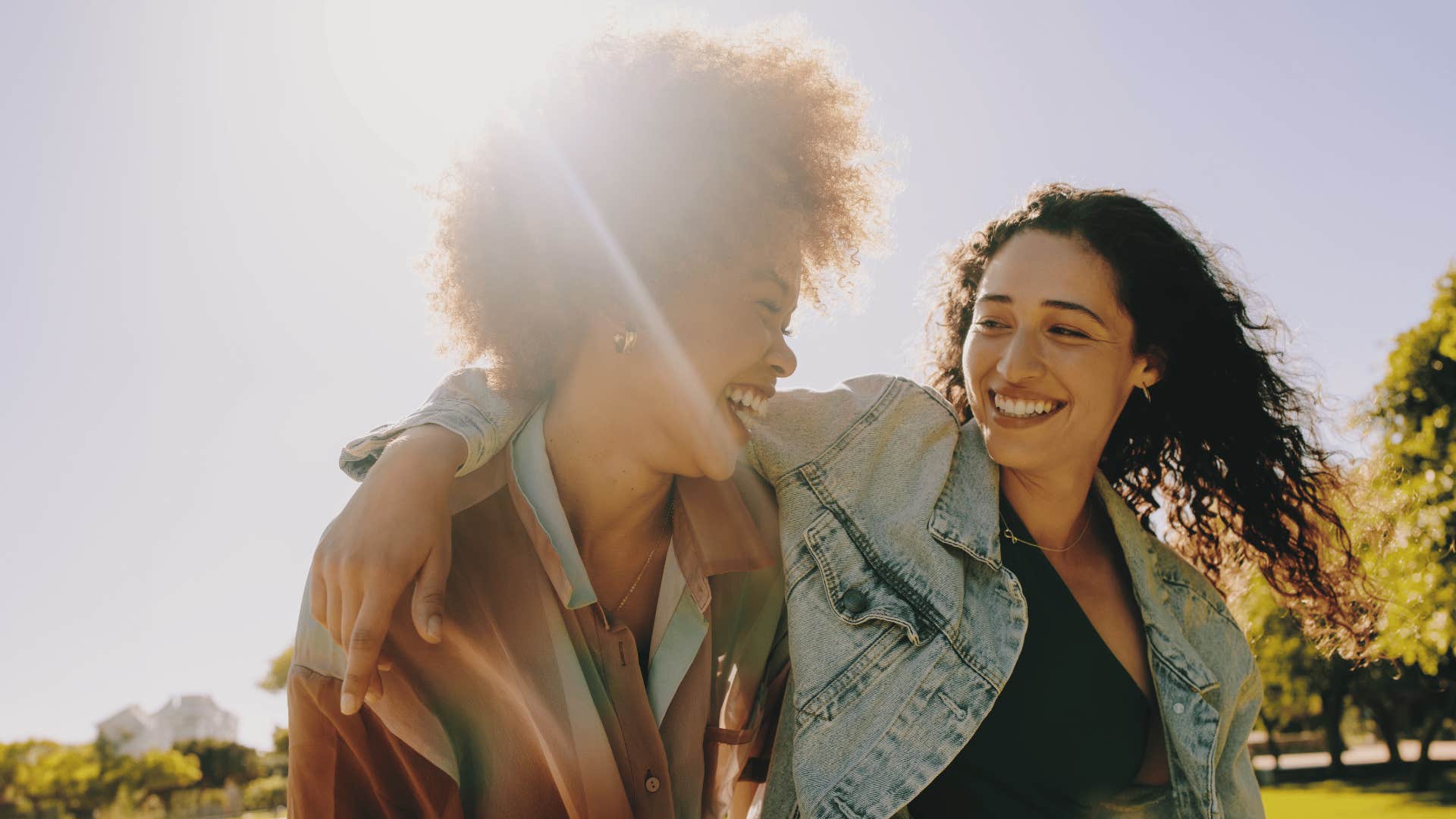 friends hugging and smiling