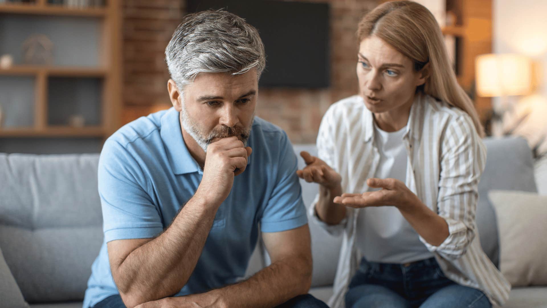 upset woman trying to talk to man