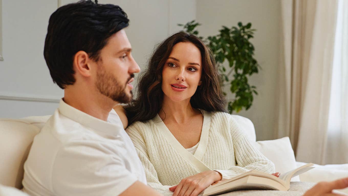 Couple making plans for future, listening to each other intently.