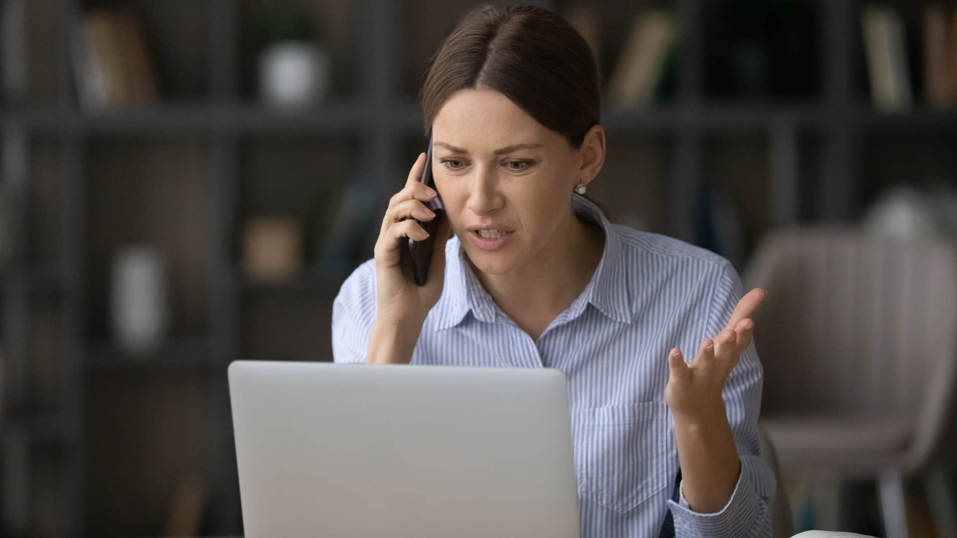 frustrated woman on the phone making excuses