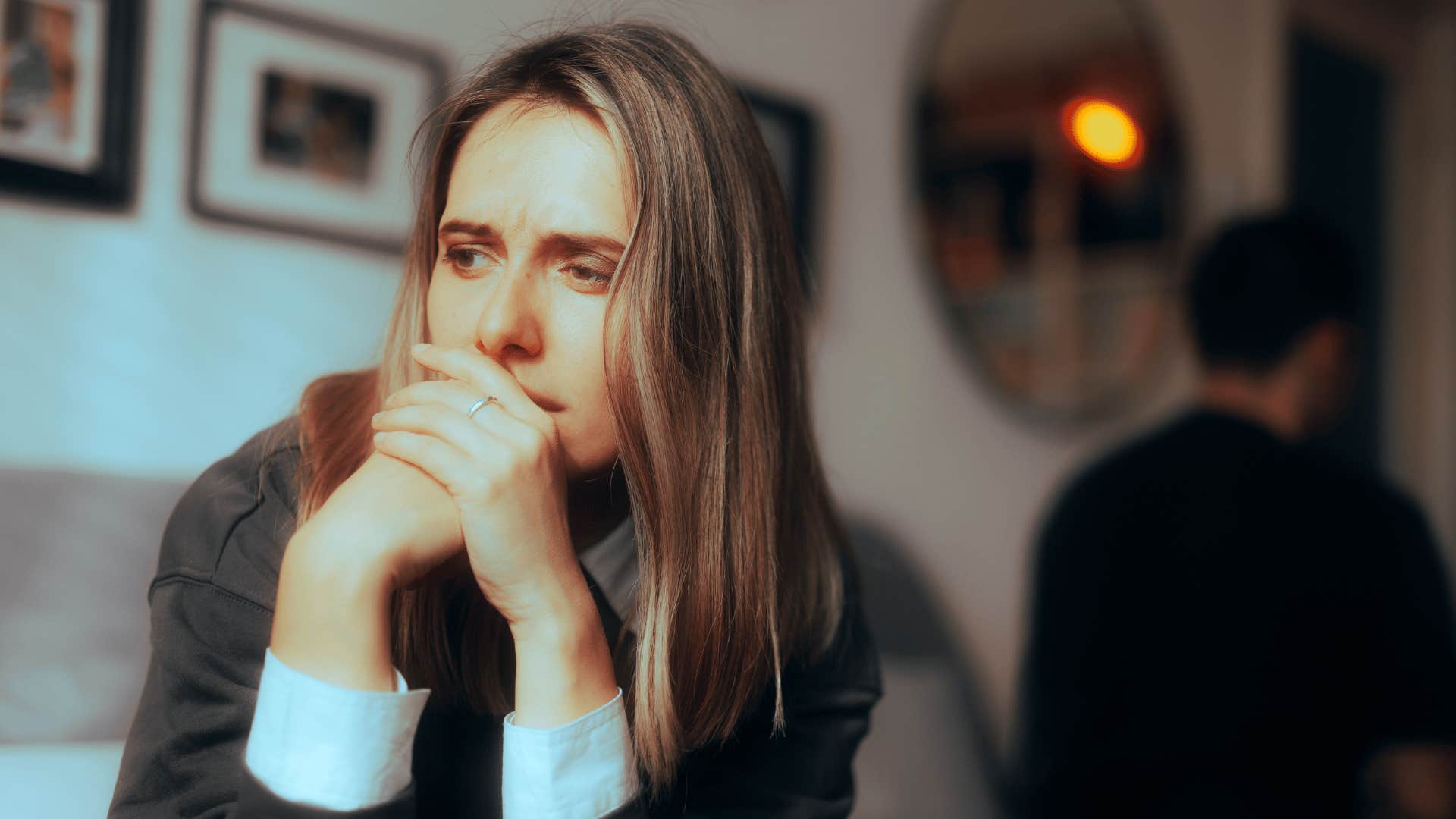 upset woman not looking at man