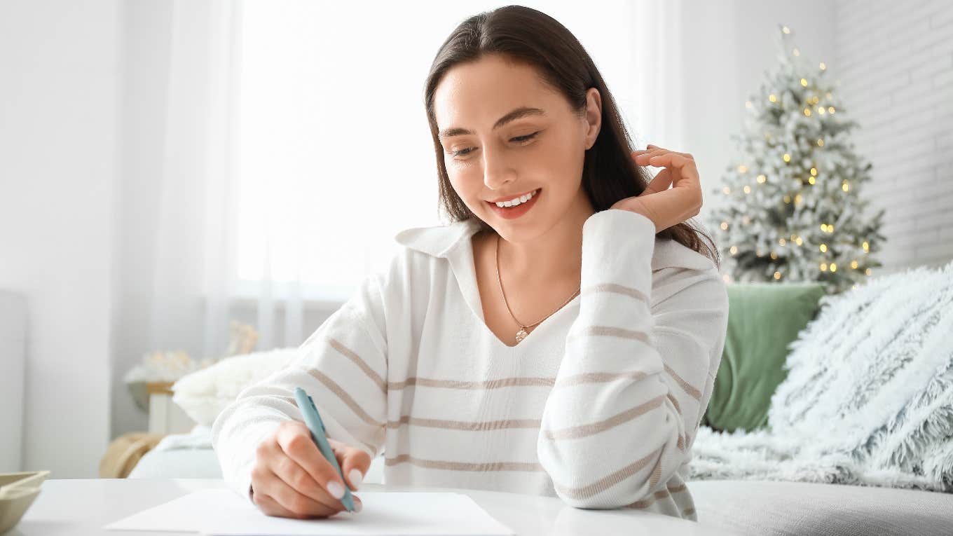 Gen Z woman letter writing