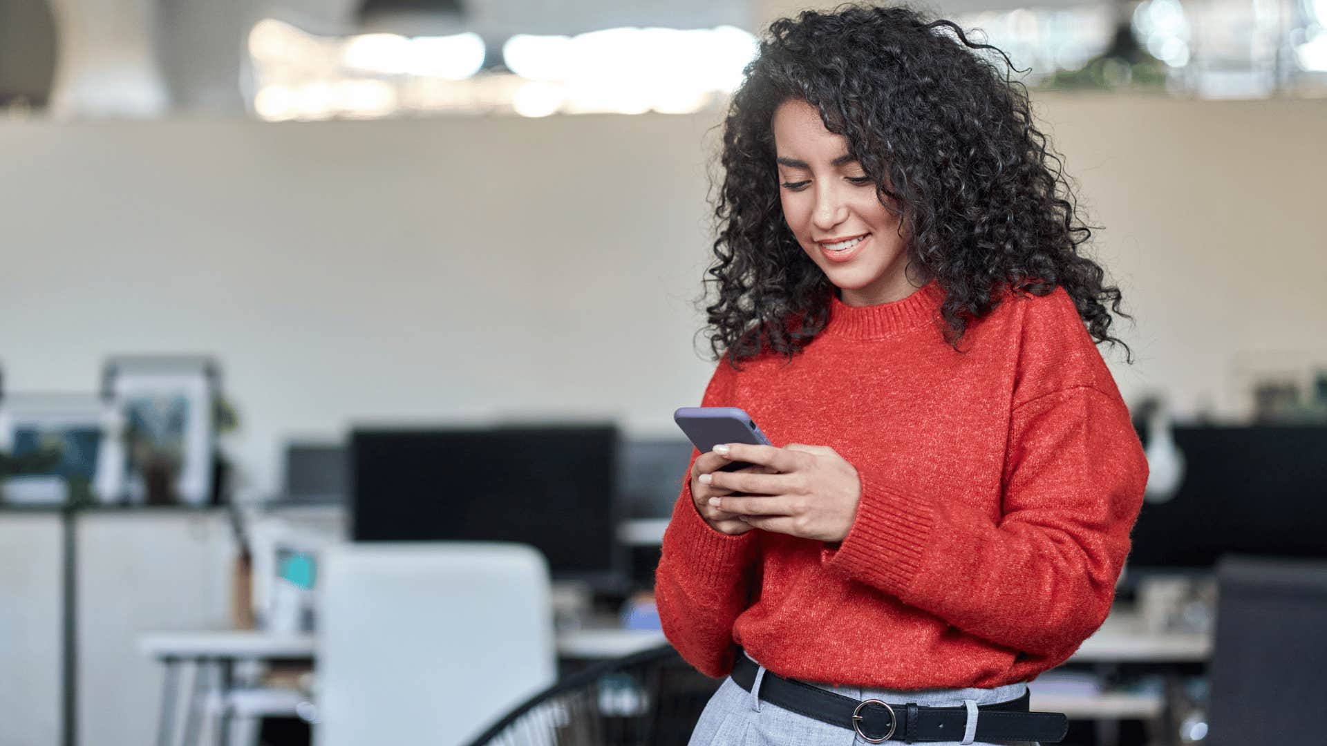 highly intelligent woman texting on phone