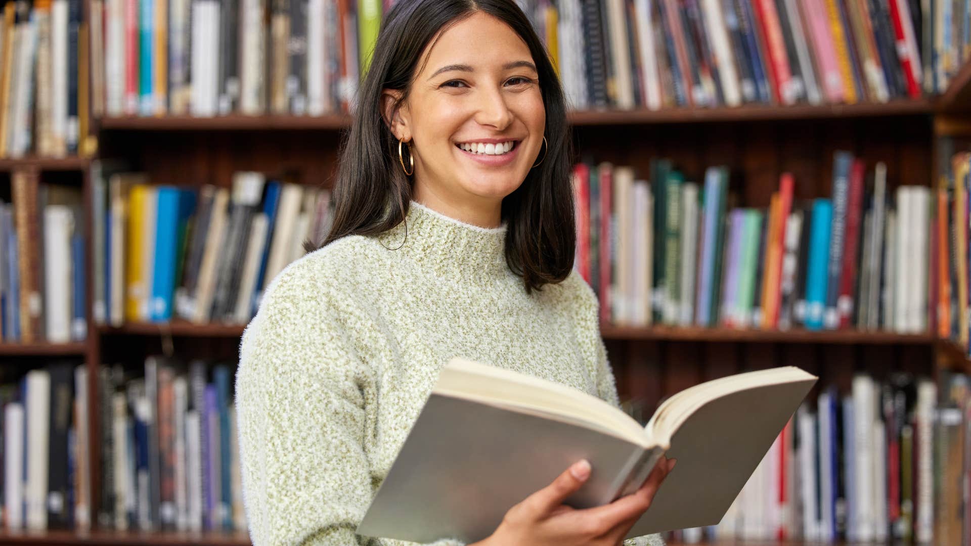 woman reading in library