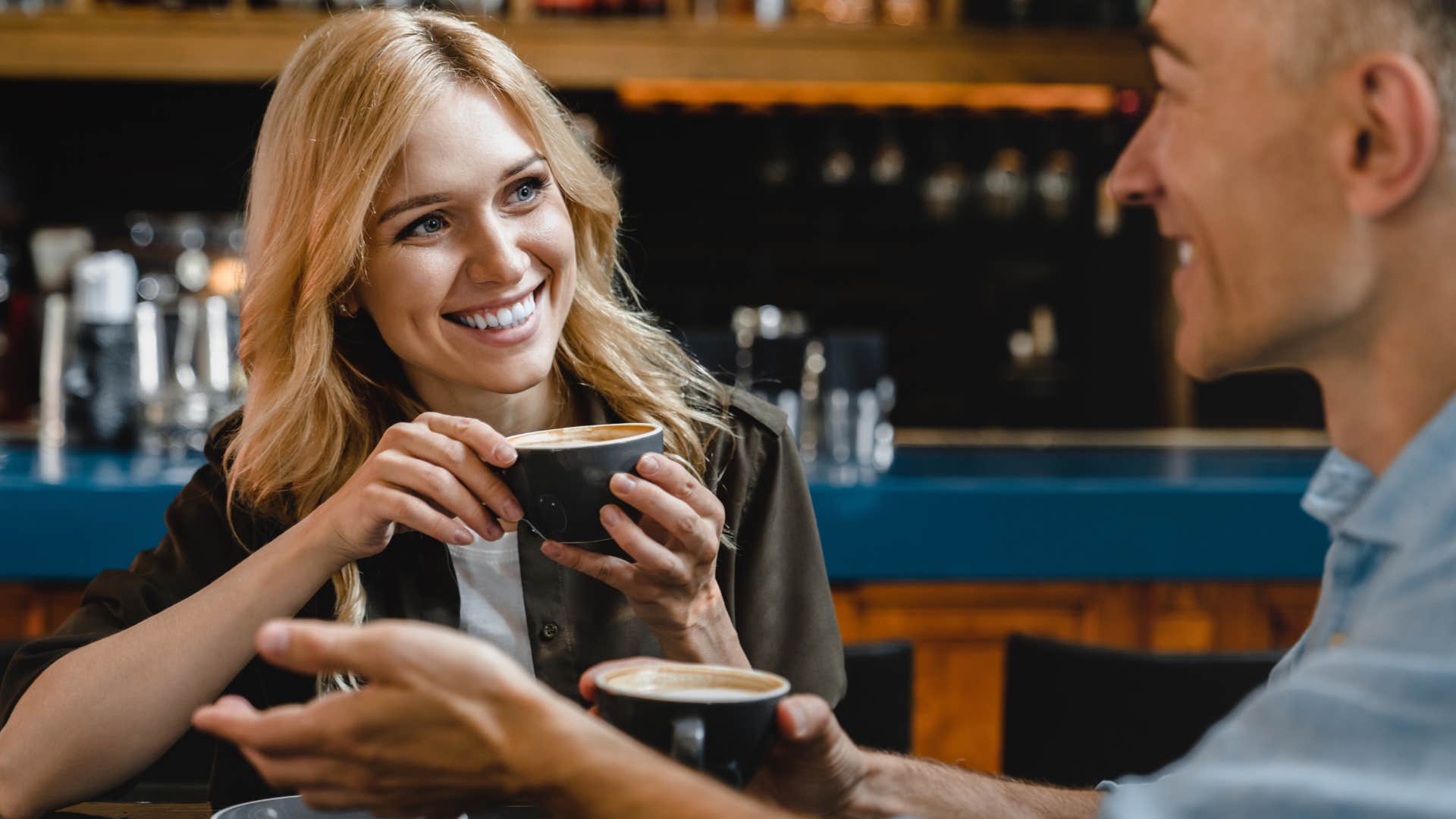 woman drinking coffee sharing stories