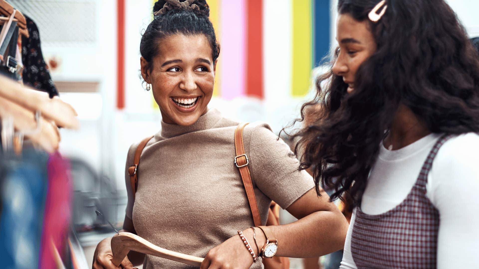 Confident women looking at clothes