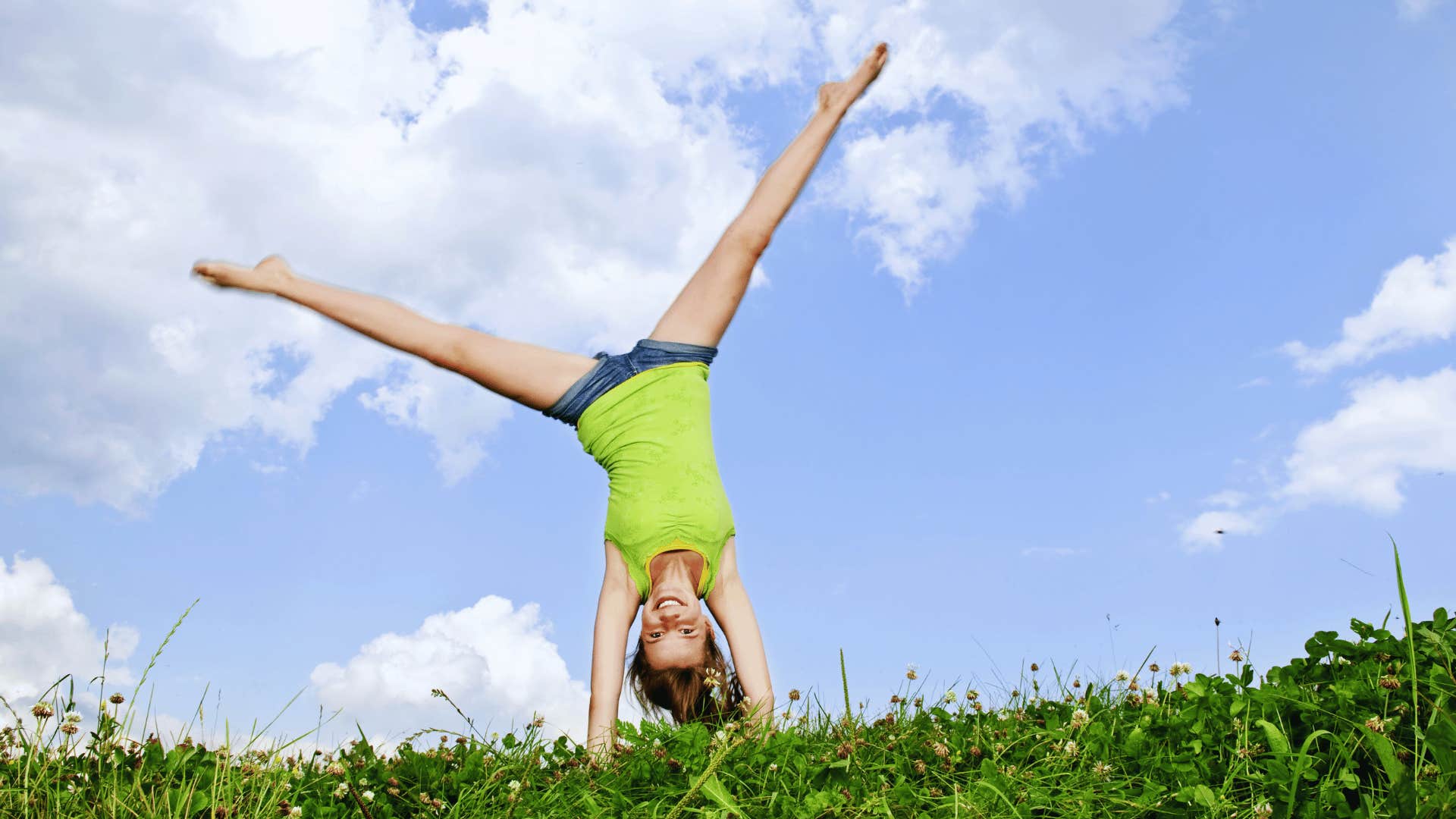 girl doing cartwheels