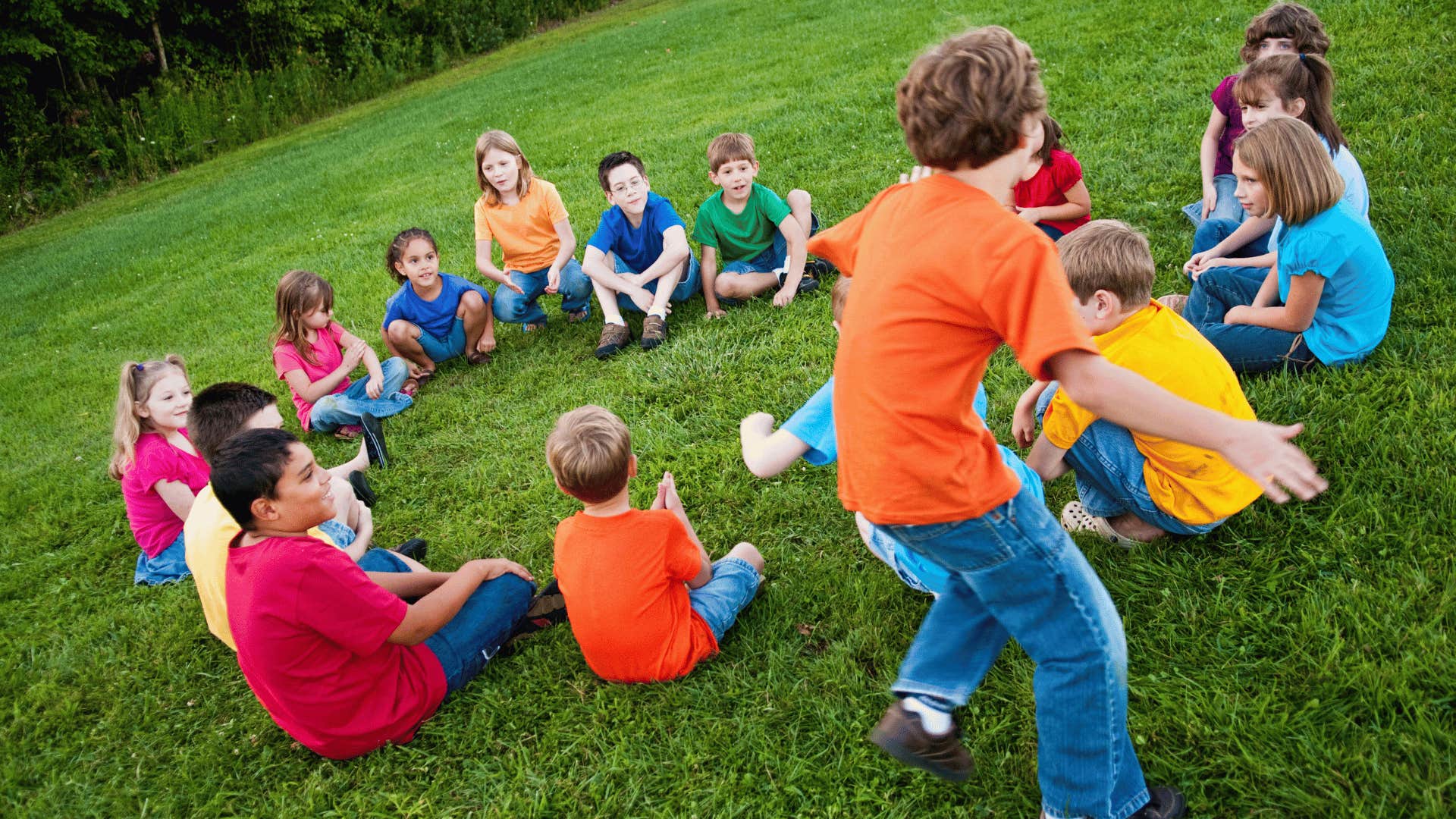 kids playing duck duck goose