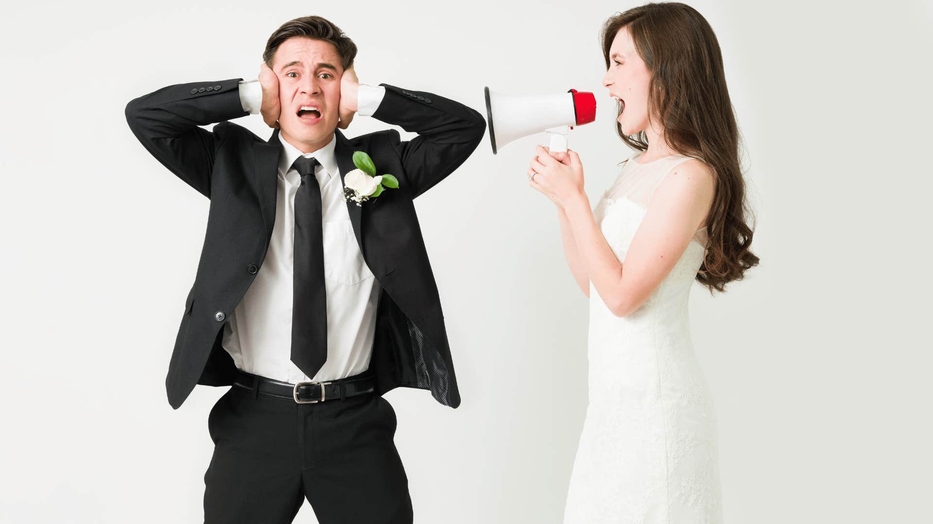 bride using megaphone to yell at groom