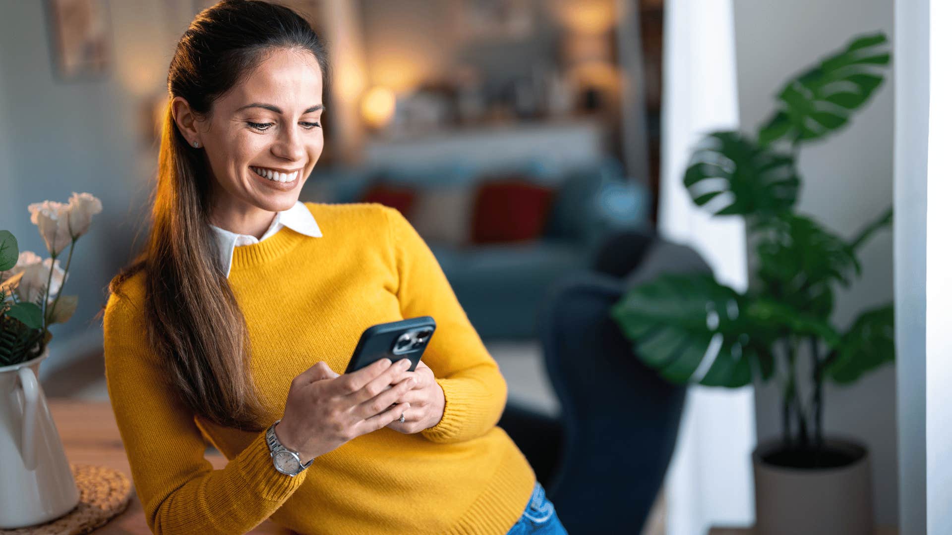 woman smiling on phone