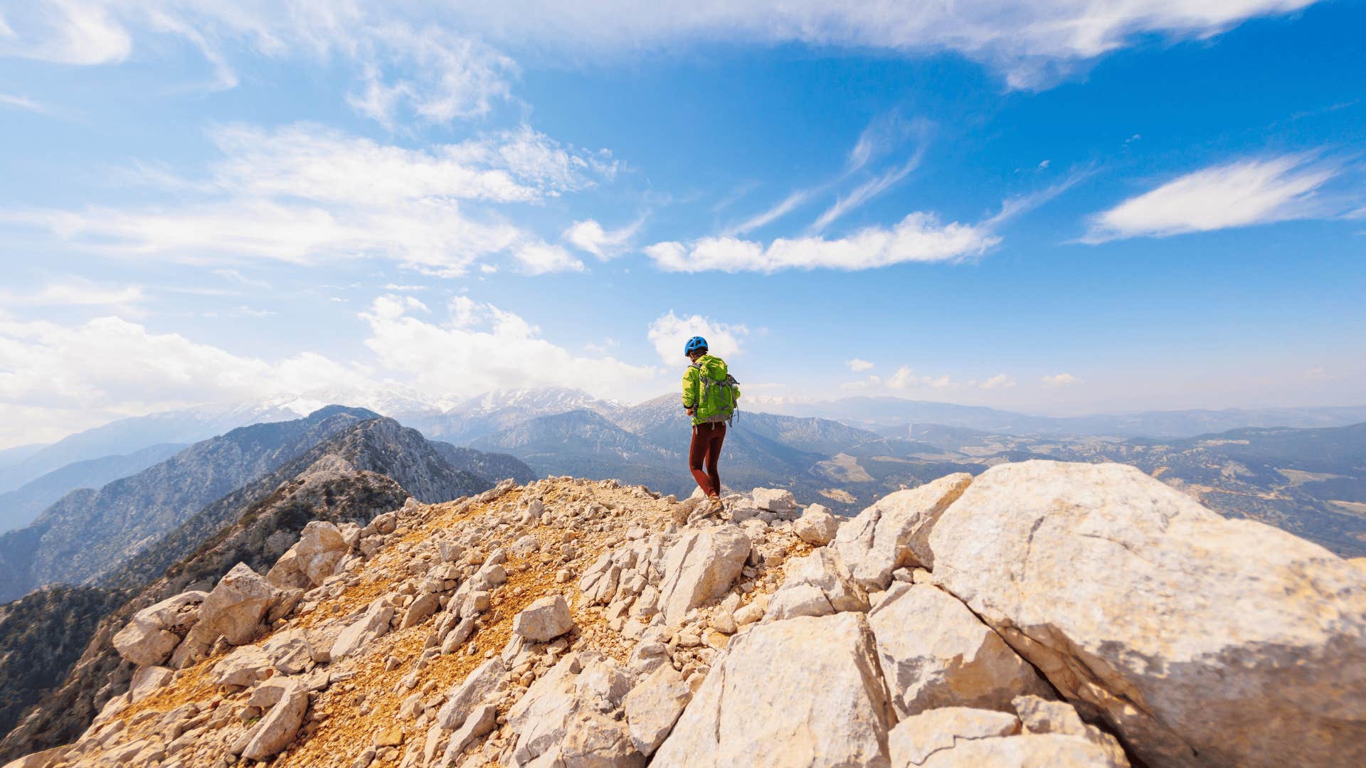 person hiking on mountain