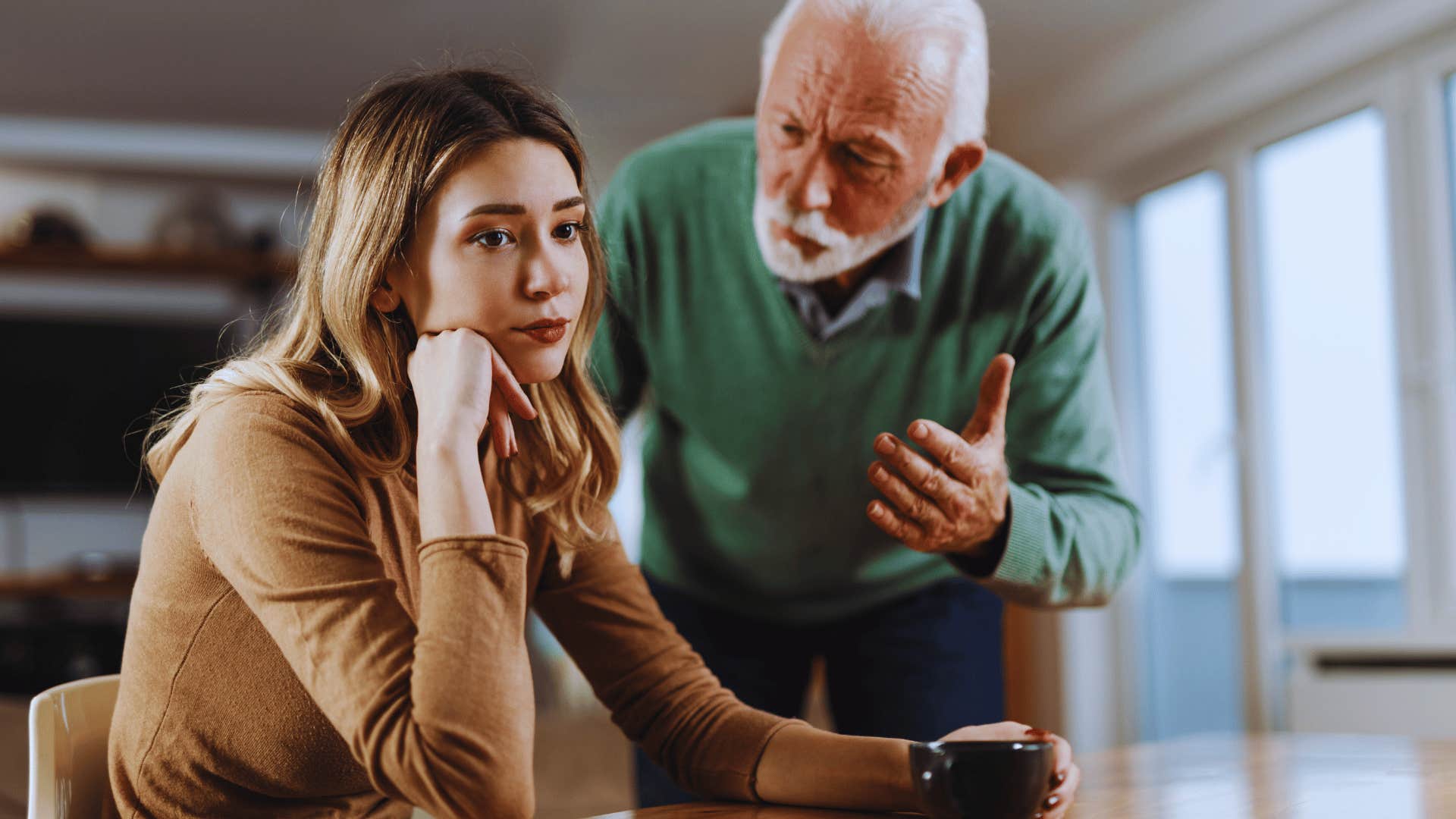 boomer man telling granddaughter two wrongs don't make a right