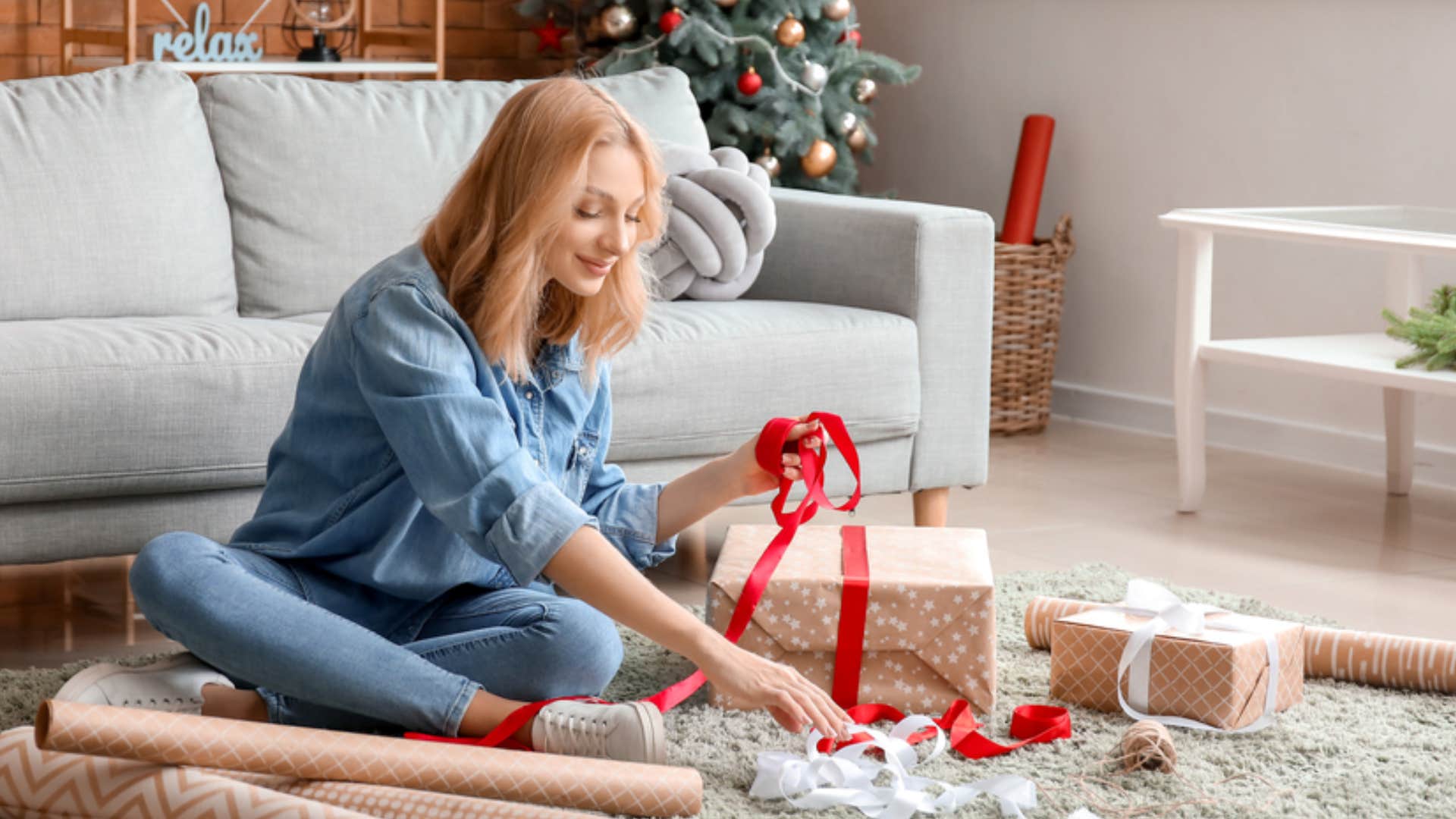 woman wrapping a present