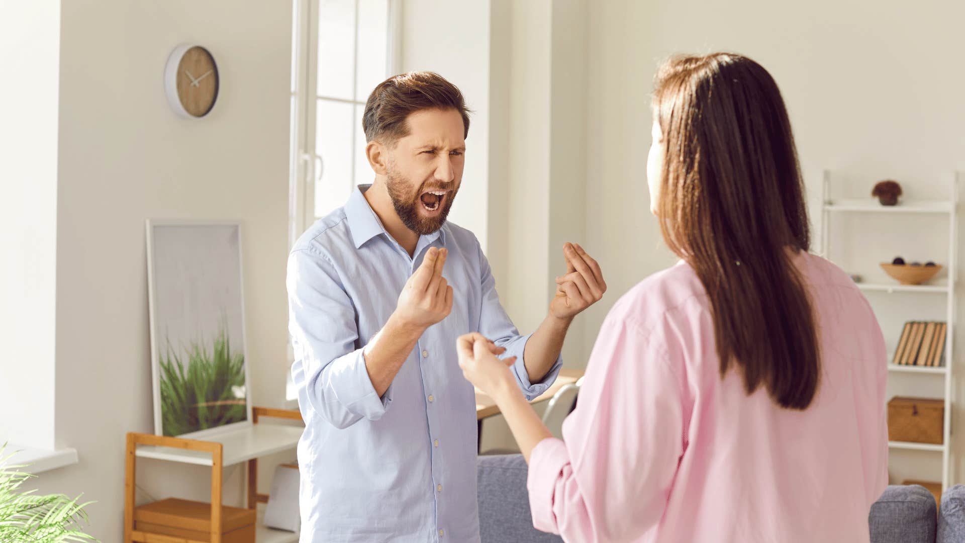 man yelling at woman