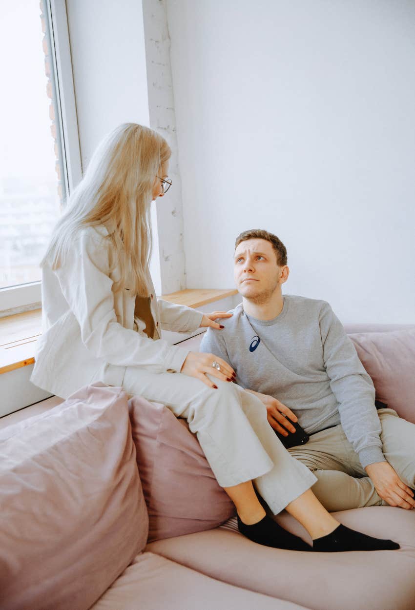 couple talking on couch