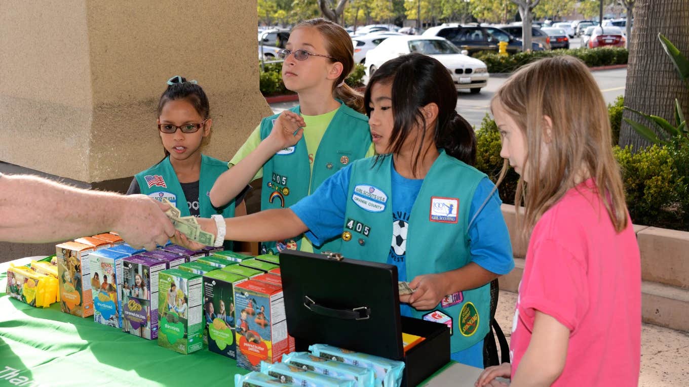 Girl scouts selling cookies