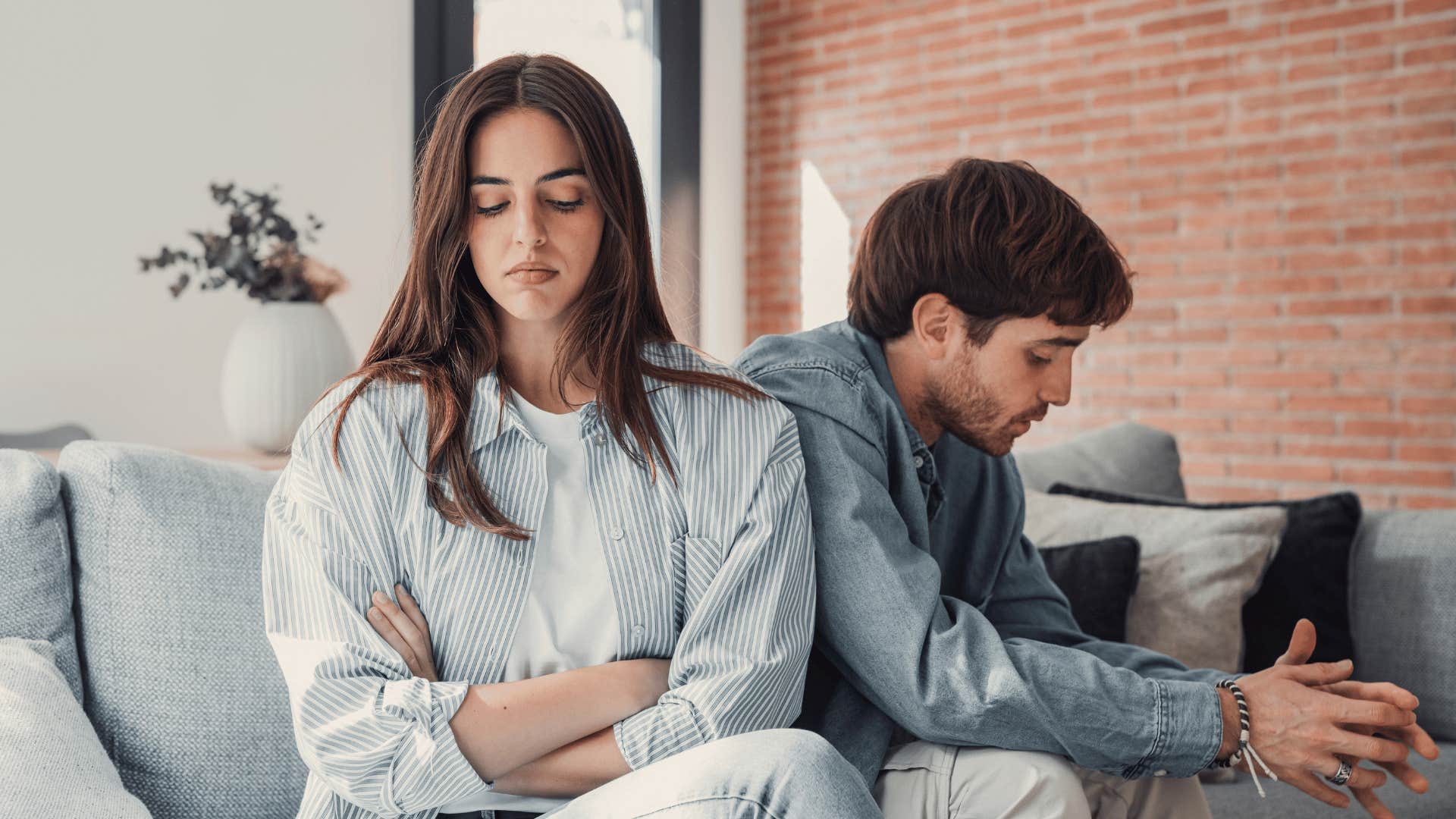 upset couple on couch