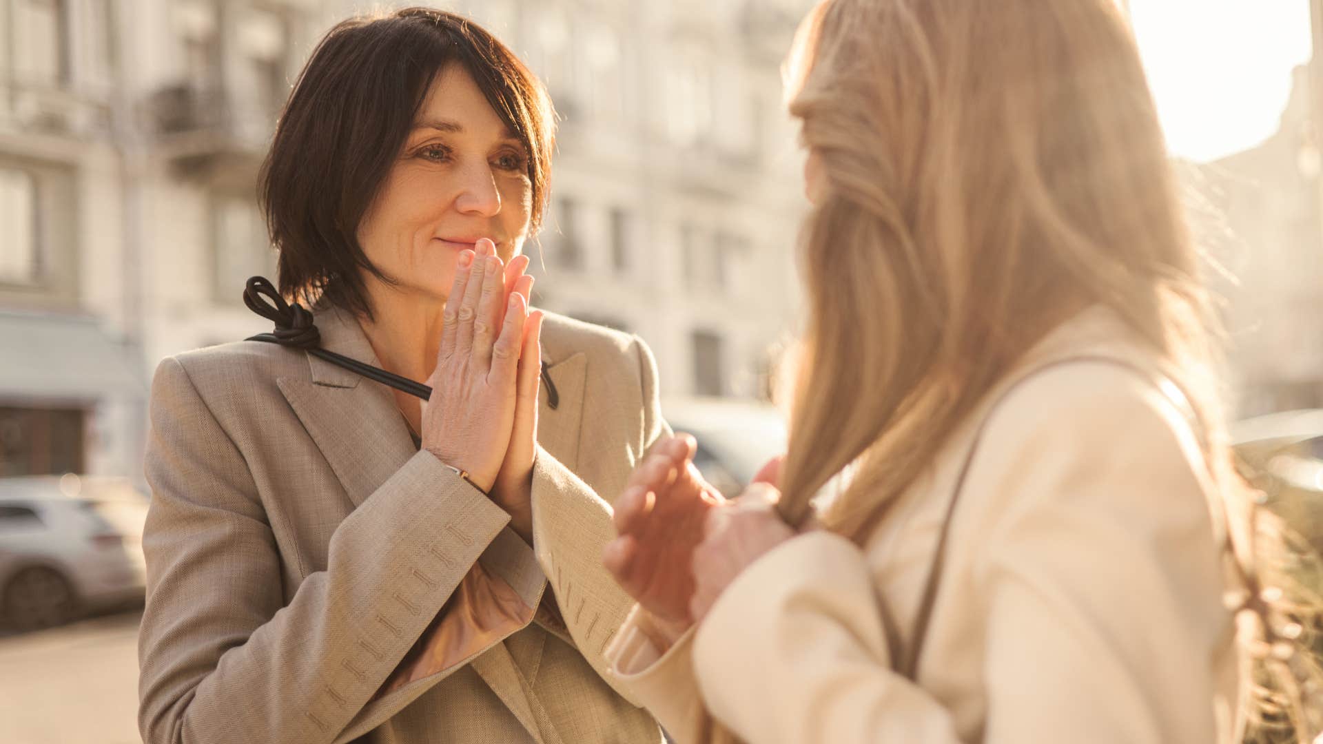 overly positive woman talking to friend