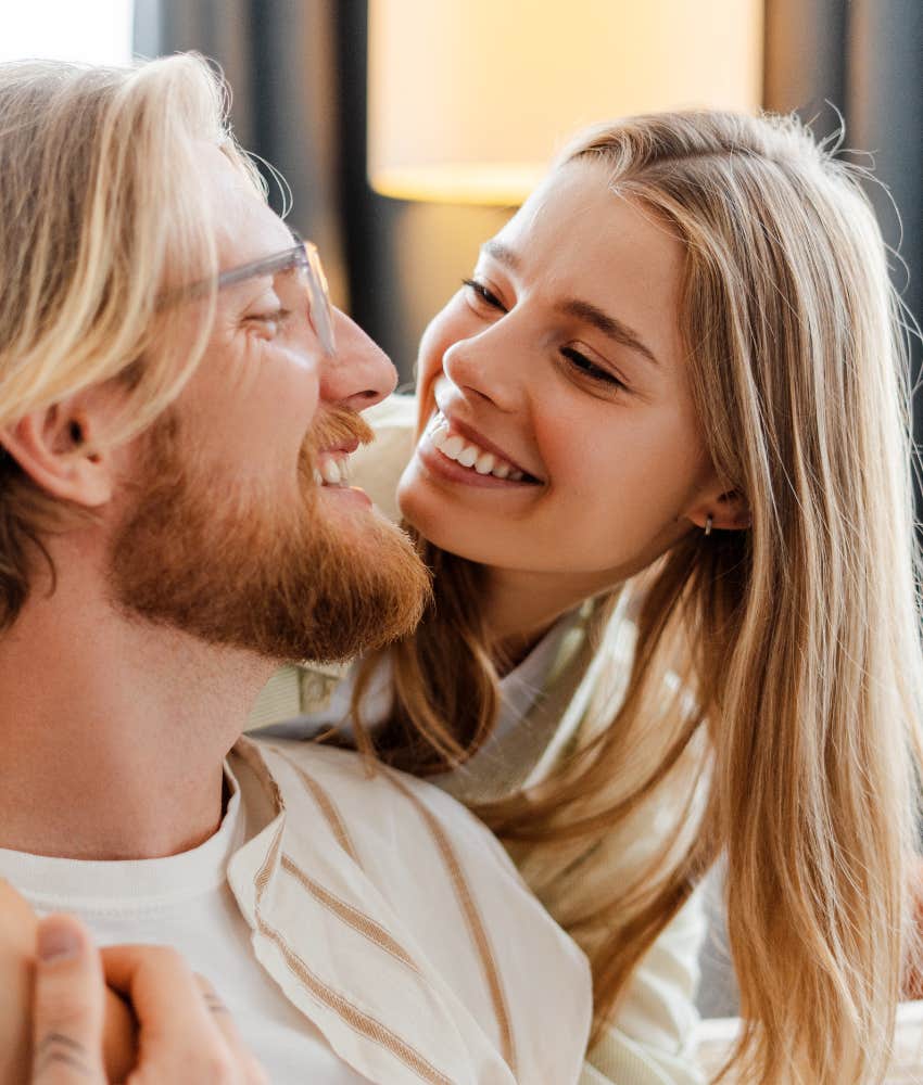 blonde couple laughing, happy to share a social circle