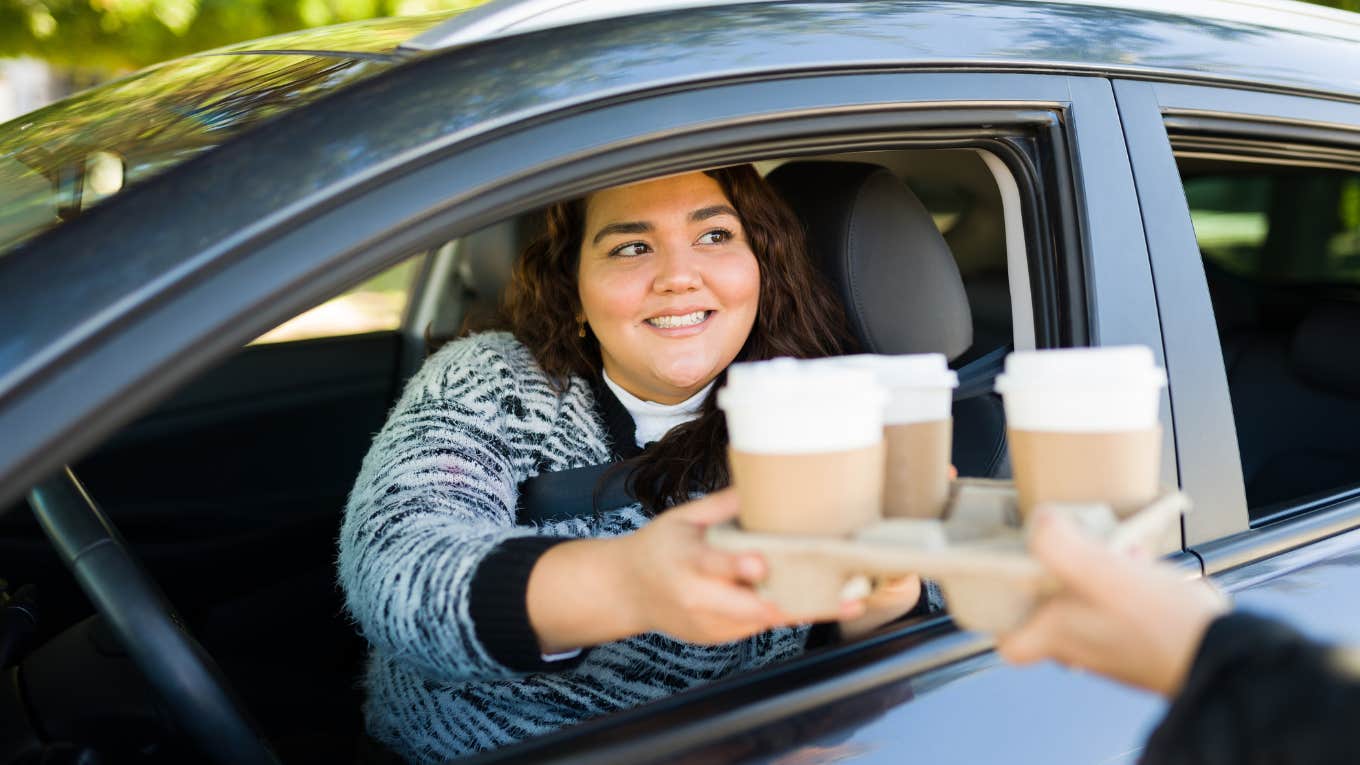 woman picking up her order at Starbucks realized a tip was added without her approval