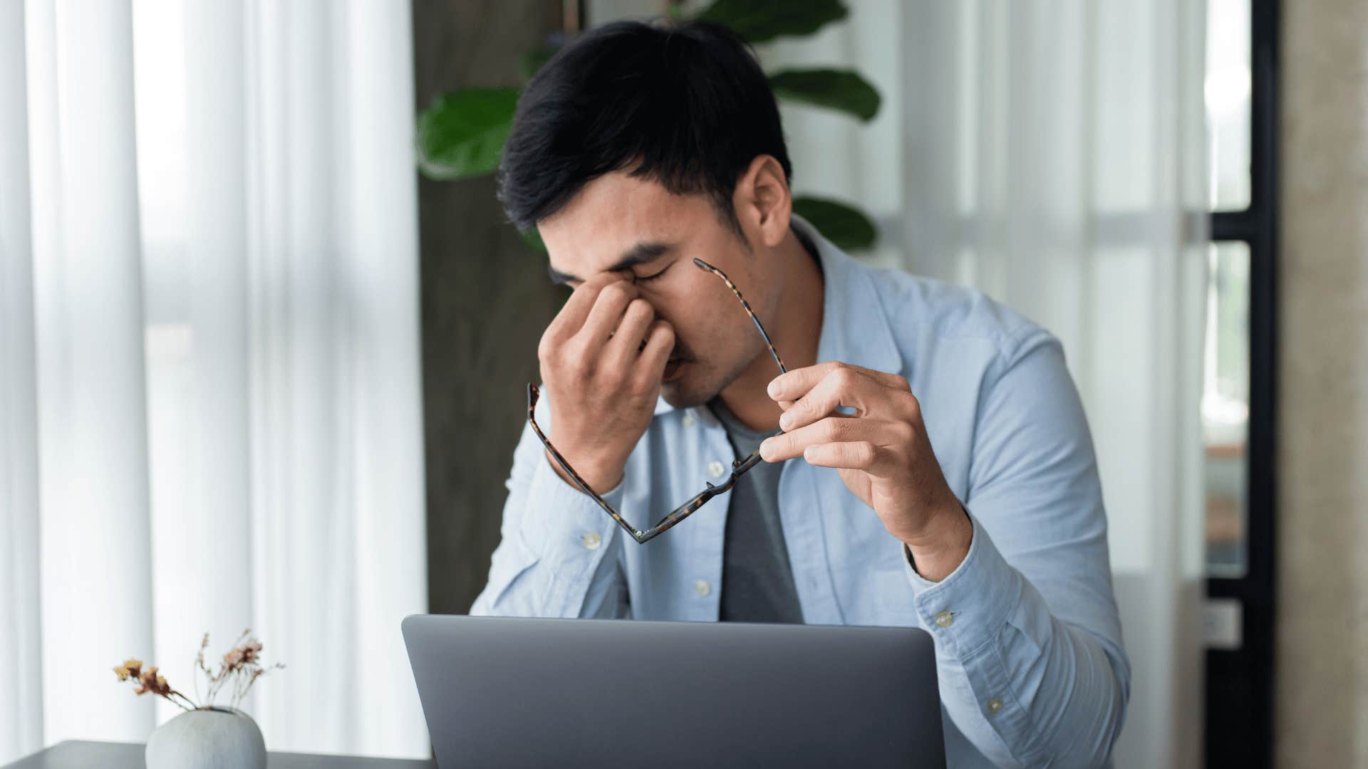 man struggling to be perfect at work