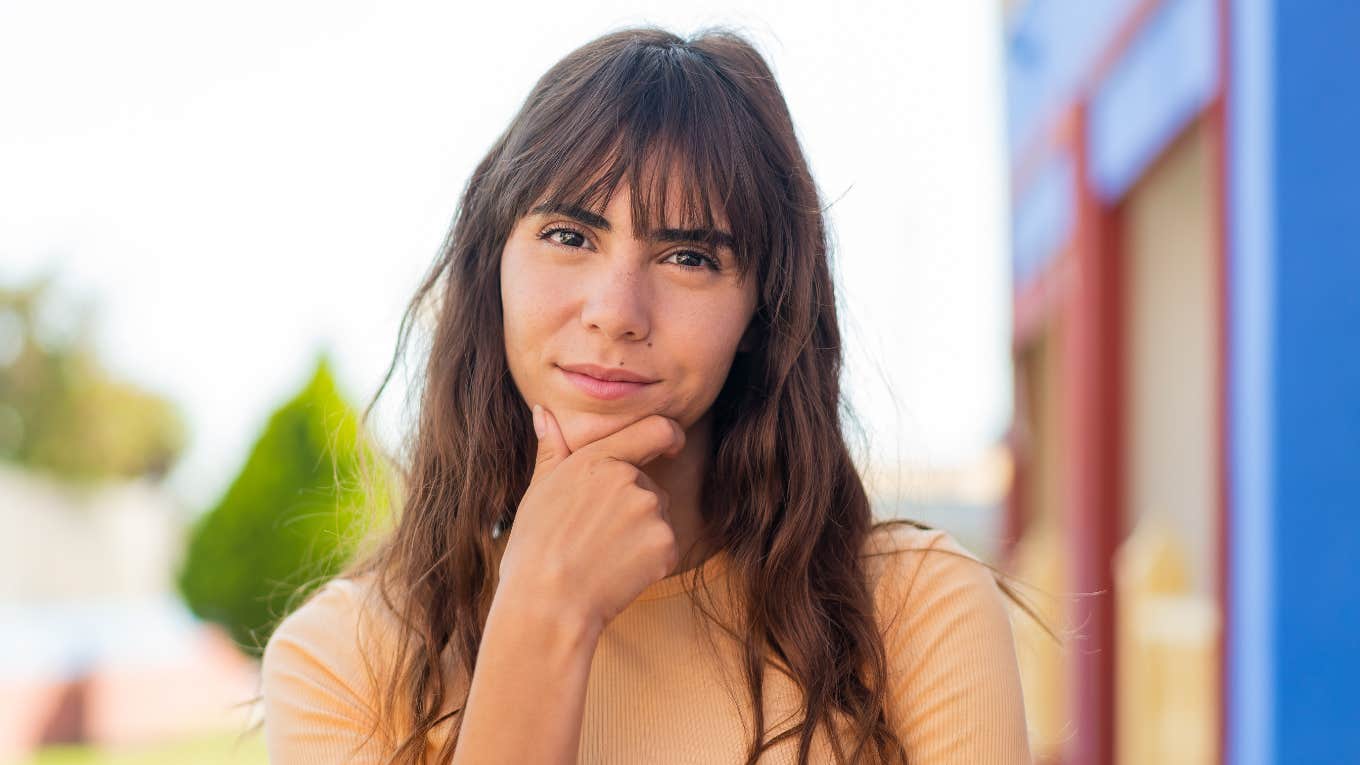 young woman thinking deeply