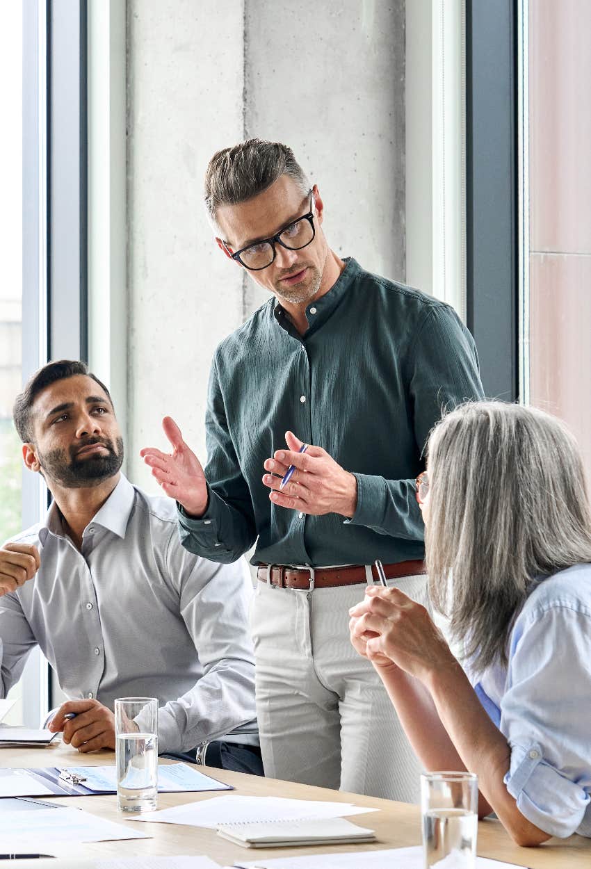 Bosses in meeting choosing who to lay off