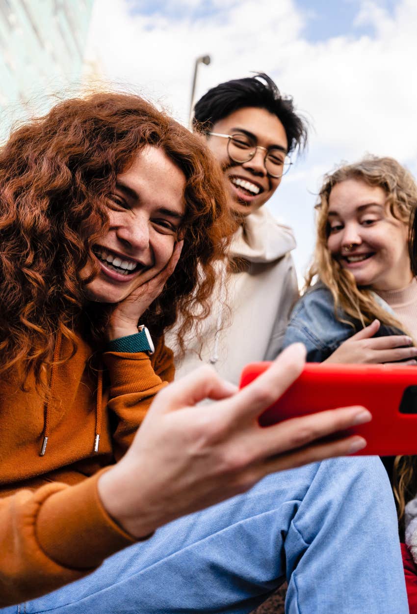 Group of Gen Z friends on a phone