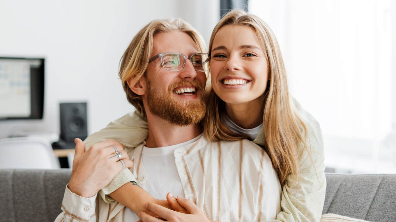 happy man and woman expressing attraction