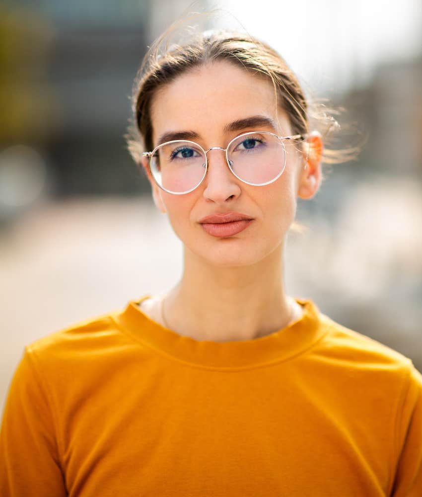 Woman with glasses is popular handling negativity with grace