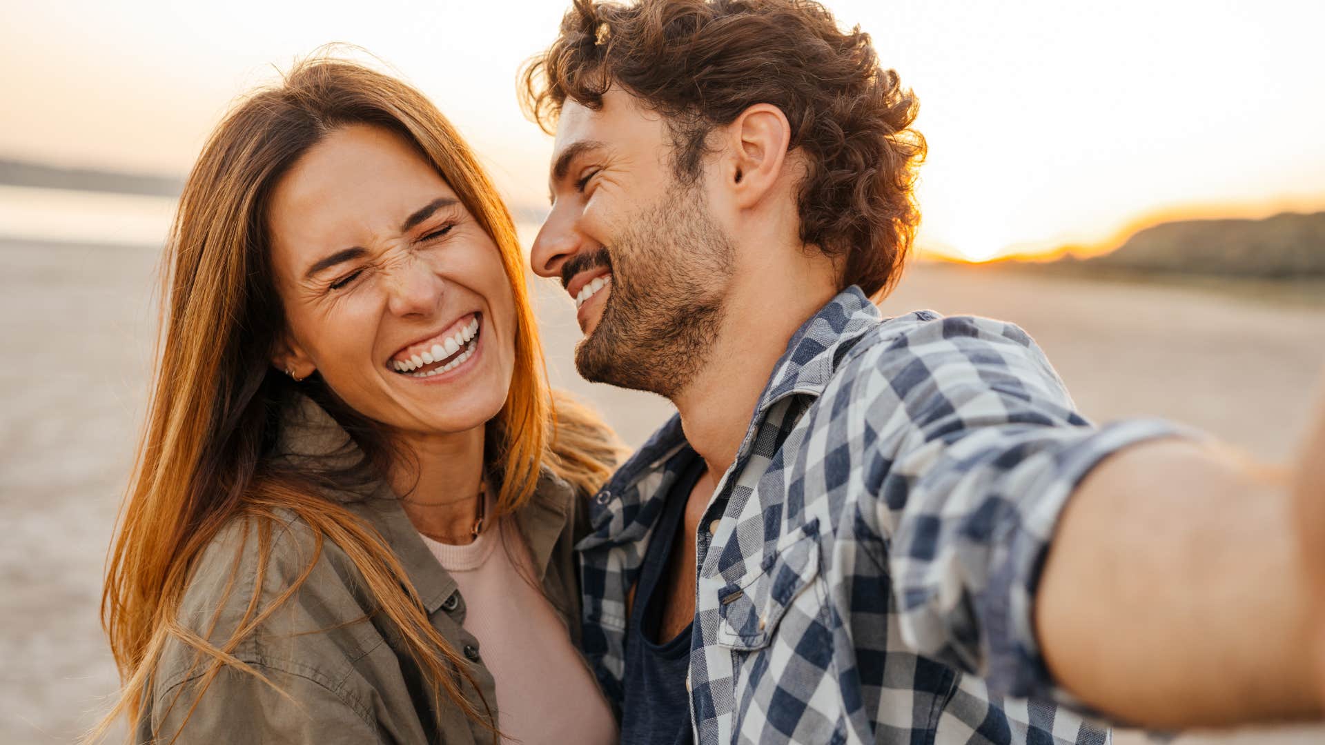 young couple laughing and actively listens