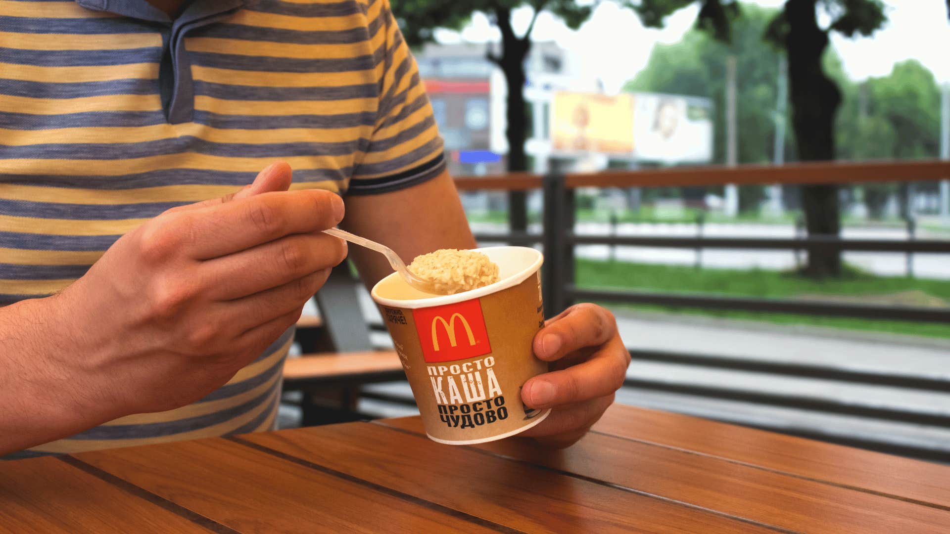 man eating mcdonald's oatmeal