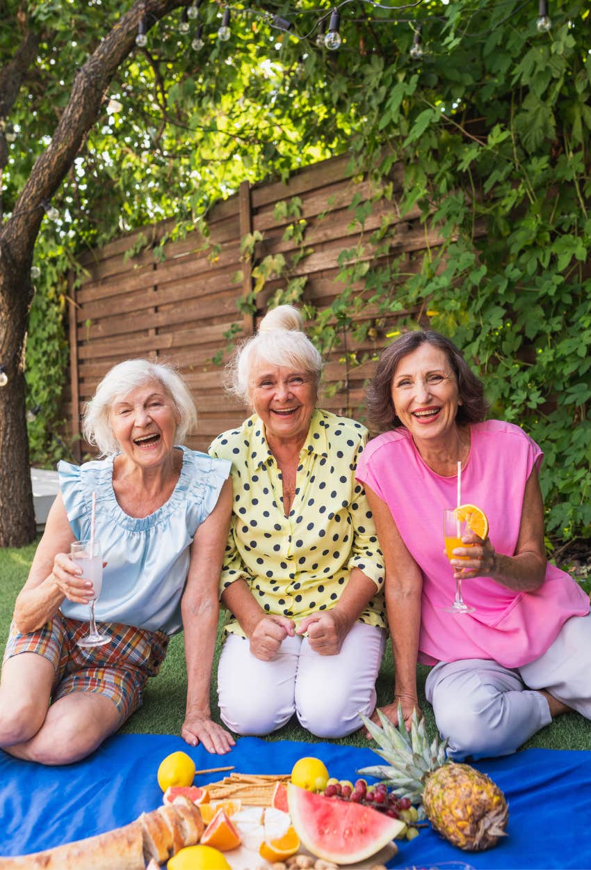 older women enjoying a picnic with friends