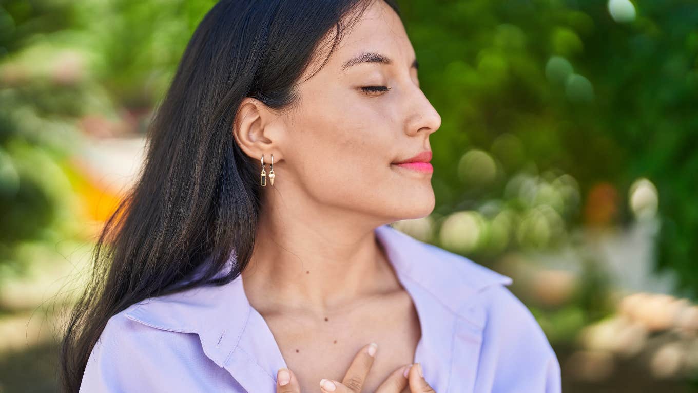 Woman doing breath of beingness technique