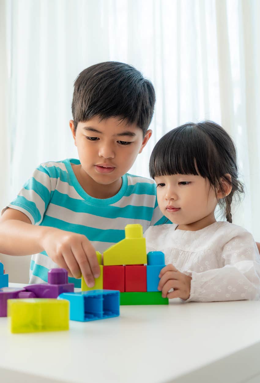 Kids playing with blocks adequate play develop basic skills