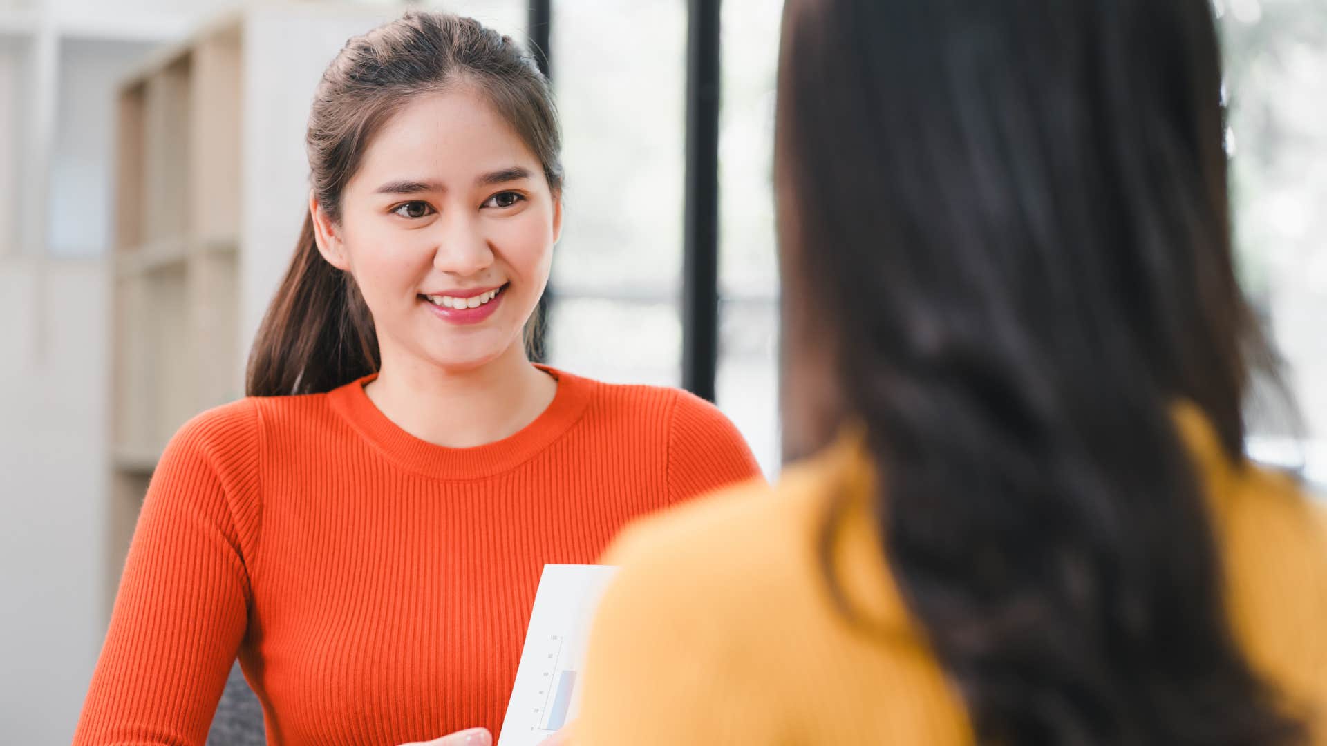 young woman engaging in conversation