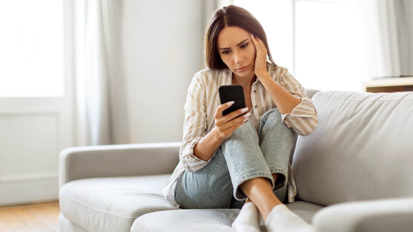 male nurse's wife looking at birthday messages he received from female co-workers